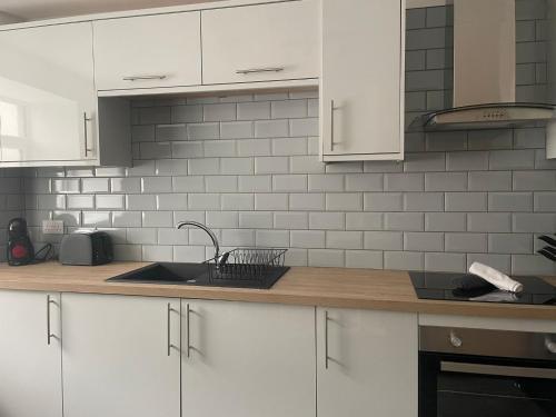 Kuchyň nebo kuchyňský kout v ubytování Belmont House
