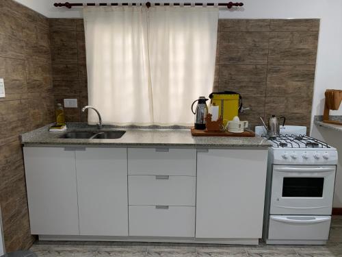 Dapur atau dapur kecil di Apartamentos Colibrí