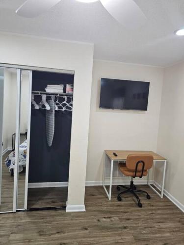 an office with a desk and a chair in a room at Spacious home with heated pool in Palm Coast! in Palm Coast