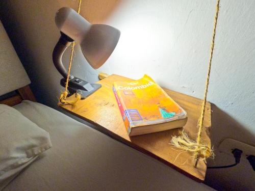 Hostel Pueblito Magico Mompósにあるベッド