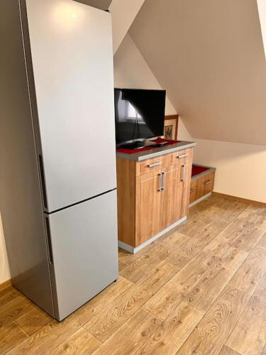 Kuchyň nebo kuchyňský kout v ubytování Forton Decco Apartments