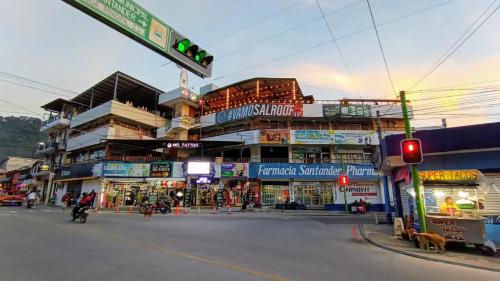 a city street with a traffic light and buildings at Royal Palace Hostal in Panajachel