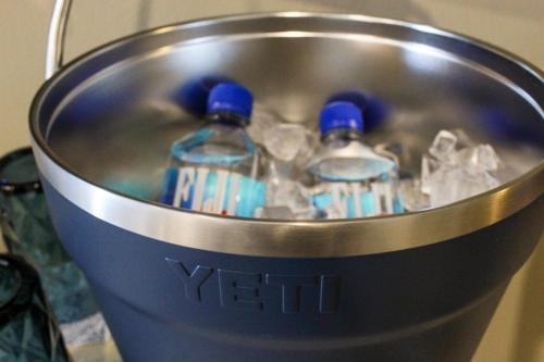 two bottles of water in a metal bucket with ice at Azul Talavera Country Club in Torreón