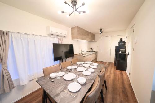 Η κουζίνα ή μικρή κουζίνα στο TOMARIE Residential Suite Kita-Senju