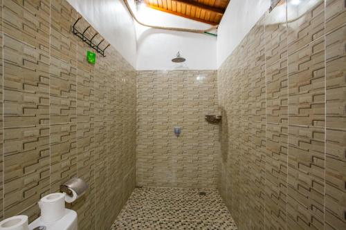 Ένα μπάνιο στο JJ HOME BALI GUEST HOUSE