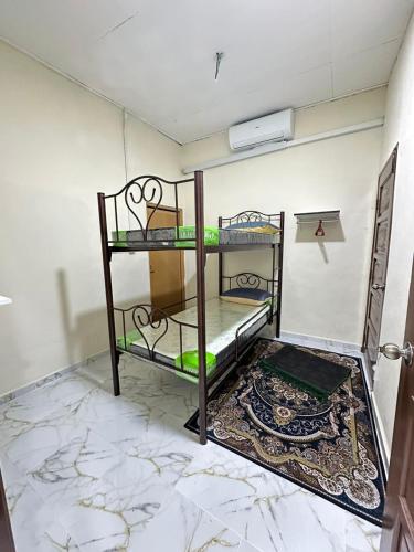 Katil atau katil-katil dalam bilik di Teratak Cikgu Roomstay 2