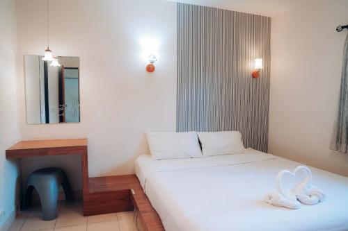 Postel nebo postele na pokoji v ubytování Two Fifty Nine Resort 259 Resort