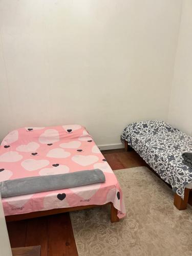Ein Bett oder Betten in einem Zimmer der Unterkunft Pousada Inaya