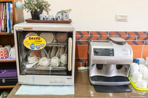 Una cocina o zona de cocina en 珠山官邸-金門古厝民宿