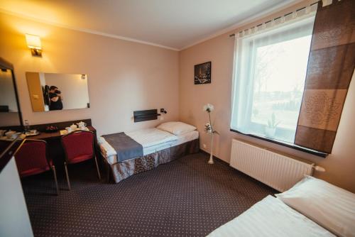 Hotel Wojtoにあるベッド