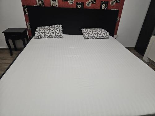 Cama o camas de una habitación en Central Class Bucharest