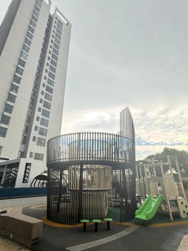 a playground in front of a building with a slide at Skytrees Comfort Room With Simple Design Concept in Johor Bahru