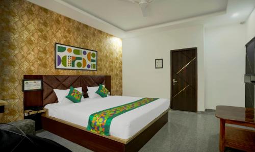Cama o camas de una habitación en Treebo NPS Grand, Ranchi Railway Station