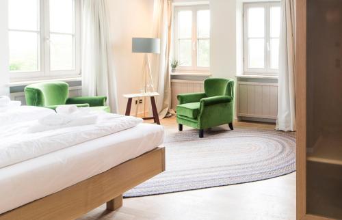 Ένα ή περισσότερα κρεβάτια σε δωμάτιο στο aussicht bio hotel restaurant cafe