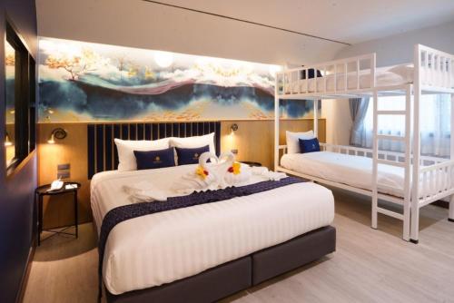 Ένα ή περισσότερα κρεβάτια σε δωμάτιο στο Khota Hill Hotel