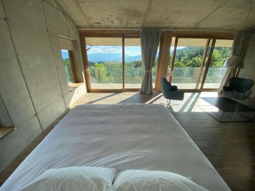 En eller flere senge i et værelse på Aïtana, Casa Cerdanya