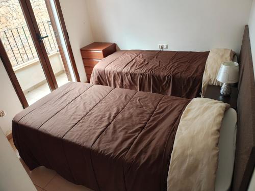 Katil atau katil-katil dalam bilik di Casa Spa