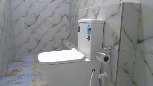 Koupelna v ubytování Ro Rich Hotel