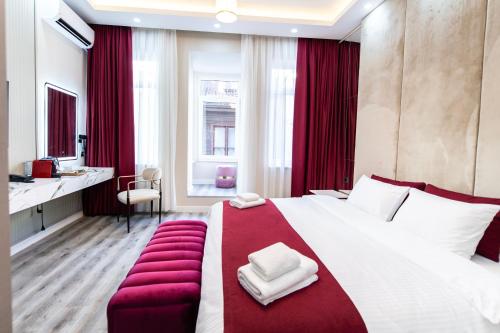 Postel nebo postele na pokoji v ubytování Hidden Pearls Boutique Hotel