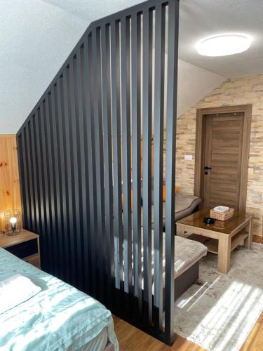 Postel nebo postele na pokoji v ubytování Vila&Apartments Helena