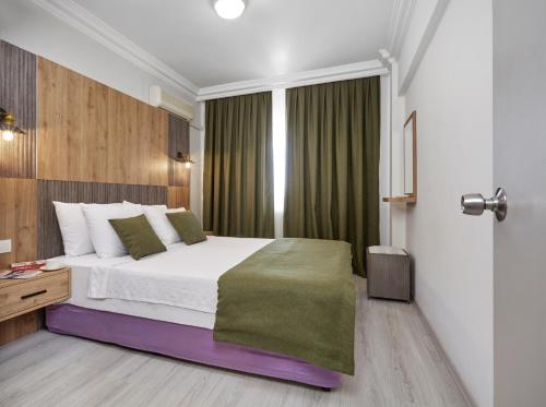 Hotel Billurcuにあるベッド