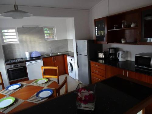 Sunshine Beach Villa tesisinde mutfak veya mini mutfak