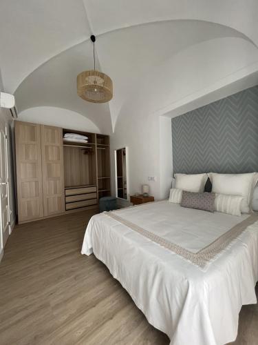 Postel nebo postele na pokoji v ubytování Apartamentos San Miguel