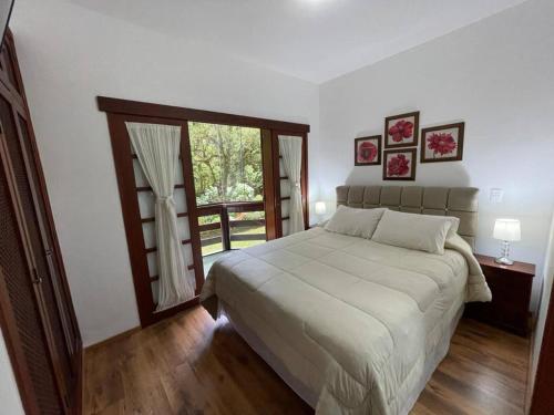 Katil atau katil-katil dalam bilik di Lindo APTO no Centro Capivari - Condomínio Privado