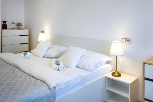 Postel nebo postele na pokoji v ubytování Apartmány U Betléma