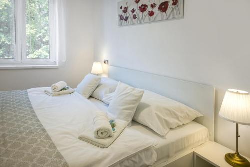 Postel nebo postele na pokoji v ubytování Apartmány U Betléma