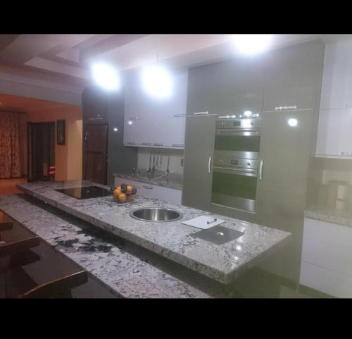 Kuchyň nebo kuchyňský kout v ubytování Tranquil Space