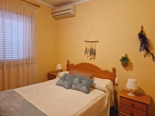 Postel nebo postele na pokoji v ubytování Chalet Playa Chilches