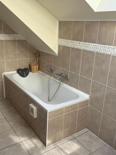 Ένα μπάνιο στο Vakantiewoning dichtbij zee