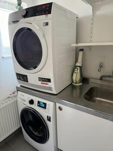 Η κουζίνα ή μικρή κουζίνα στο Vakantiewoning dichtbij zee