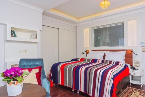Ada Hotel Istanbulにあるベッド