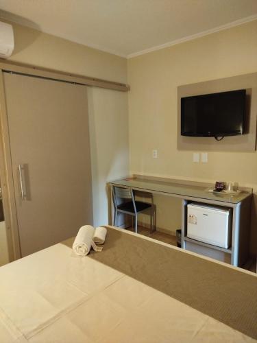 Televisyen dan/atau pusat hiburan di Savana Park Hotel