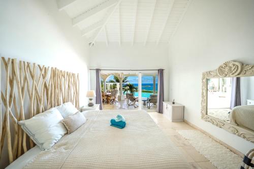 Postel nebo postele na pokoji v ubytování Orient Bay Star Villa