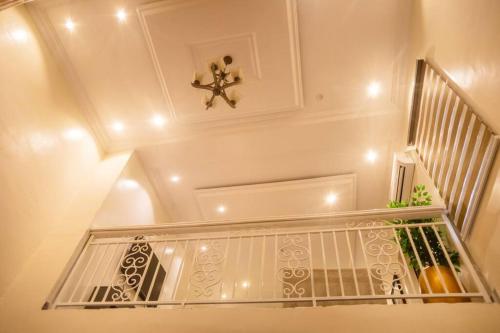 Fotografie z fotogalerie ubytování West End Mansion v destinaci Ikuata
