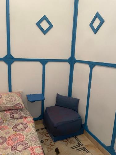 Postel nebo postele na pokoji v ubytování BLUE RIAD