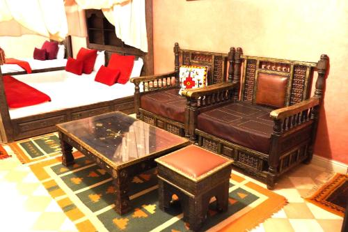 Ein Bett oder Betten in einem Zimmer der Unterkunft Riad Saida Atlas