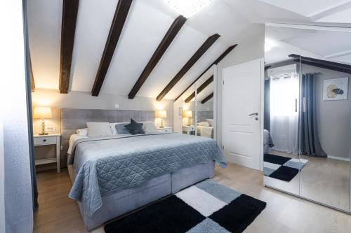 Ένα ή περισσότερα κρεβάτια σε δωμάτιο στο Vacation House Cavtat