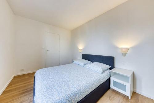 Katil atau katil-katil dalam bilik di Logement cosy à 2 min de la gare