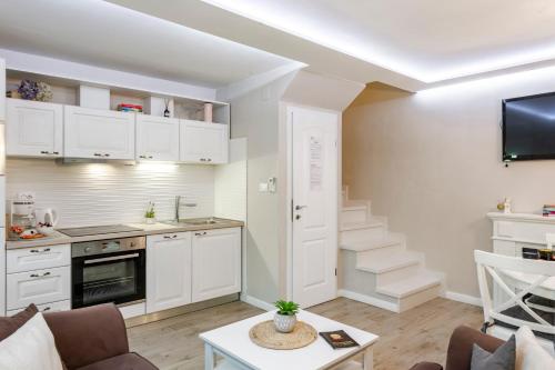 Η κουζίνα ή μικρή κουζίνα στο Vacation House Cavtat