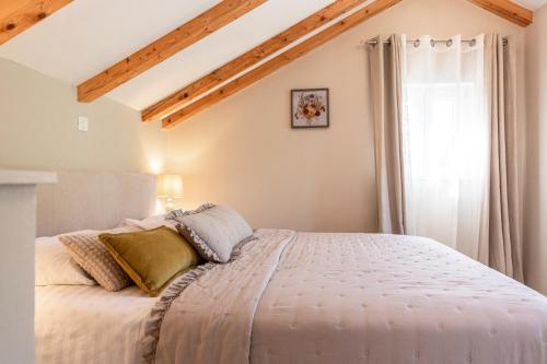 Ένα ή περισσότερα κρεβάτια σε δωμάτιο στο Vacation House Cavtat