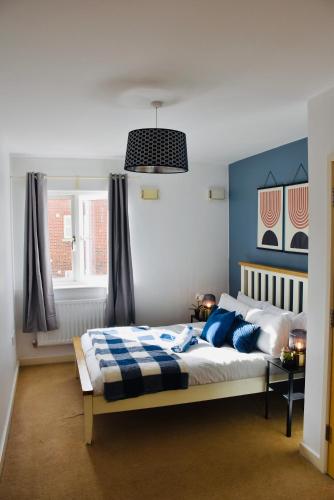 Ένα ή περισσότερα κρεβάτια σε δωμάτιο στο Luxurious & Spacious 2 bed Apartment in Milton Keynes