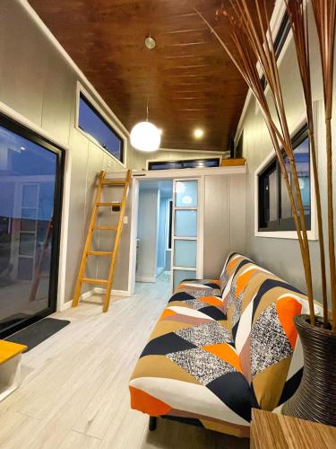 Гостиная зона в Tiny House Premium con vistas panorámicas y cercanía a la playa - Pet Friendly