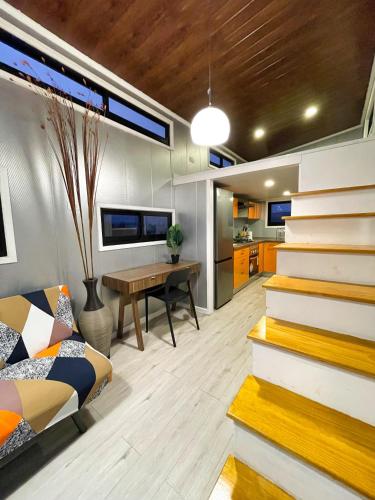 Гостиная зона в Tiny House Premium con vistas panorámicas y cercanía a la playa - Pet Friendly