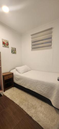 Cama o camas de una habitación en HOSTAL LA MODERNA