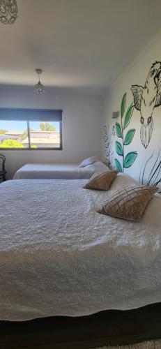Cama o camas de una habitación en HOSTAL LA MODERNA