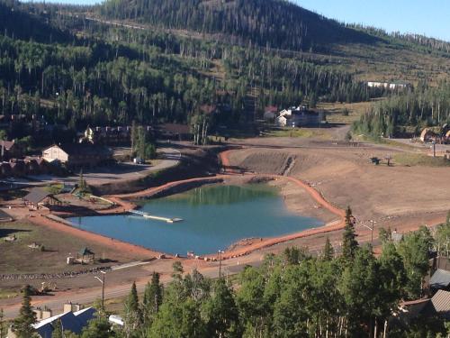 an aerial view of a lake in a field at Royal Queen Suite Pool-Spa Ski-in out Gym, Sauna, Laundry, BBQ in Brian Head
